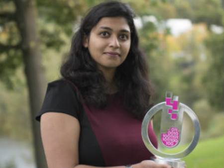 Anita George with her Data Lab trophy for her data analysis project with NHS National Services Scotland 
