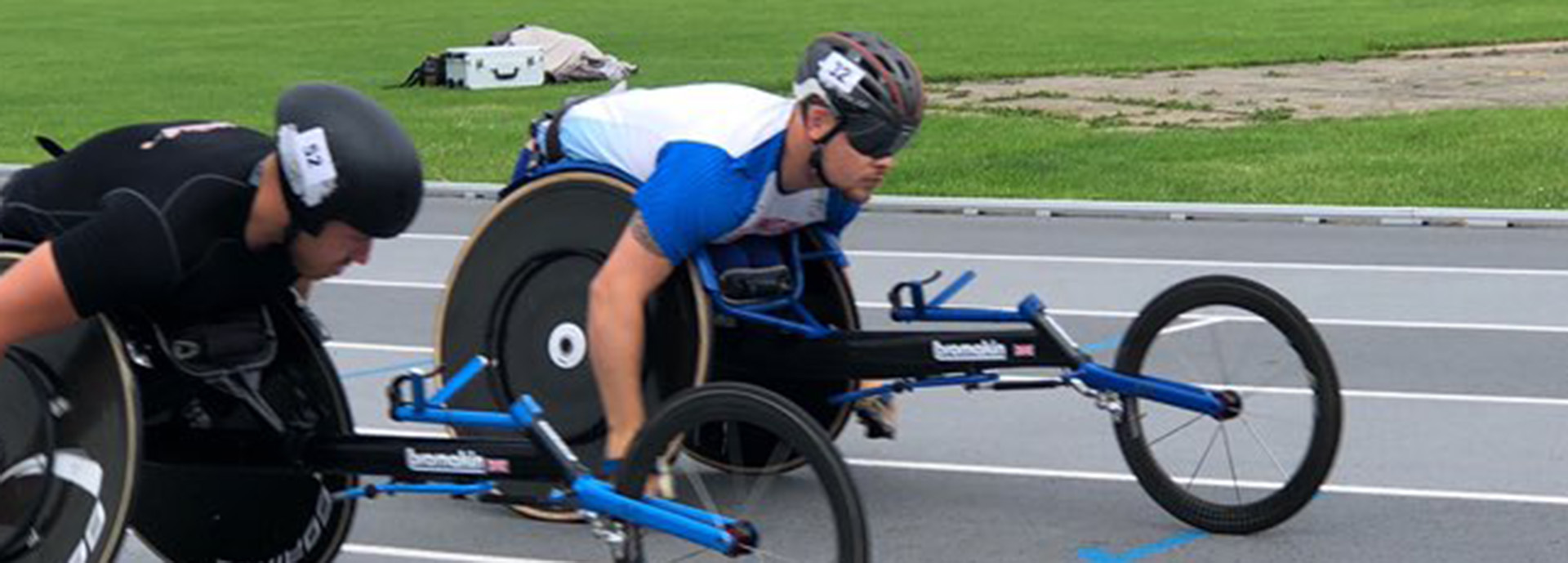Ben Rowlings in racing chair on track