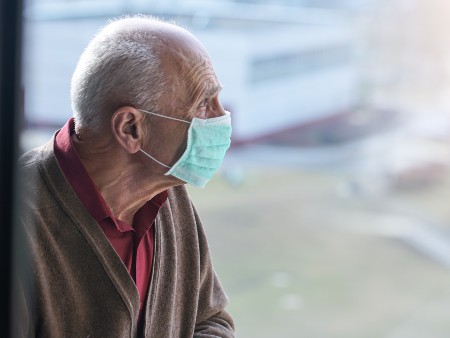Older man wearing a face mask