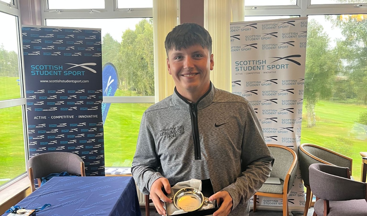 Golfer Ross Laird with the Autumn Trophy